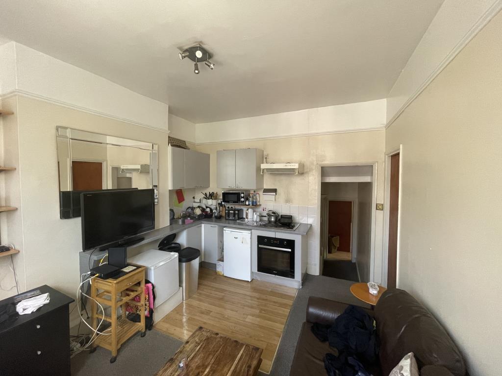 Lot: 156 - VACANT THREE-BEDROOM FLAT - inside image of living & kitchen area combined